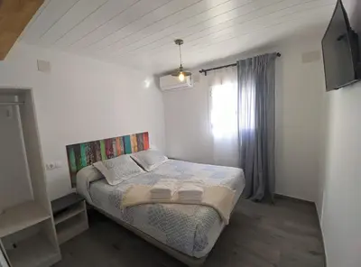 Cama o camas de una habitación en La Dubanesa