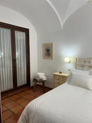 Cama o camas de una habitación en Casa Rural Mijarra ****