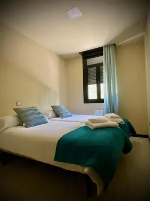 Cama o camas de una habitación en Mi Refugio