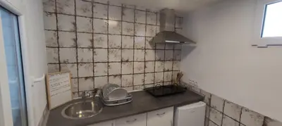 Una cocina o zona de cocina en apartamentos fuente nueva sande