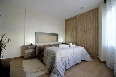 Cama o camas de una habitación en Apartamento turístico la Vera