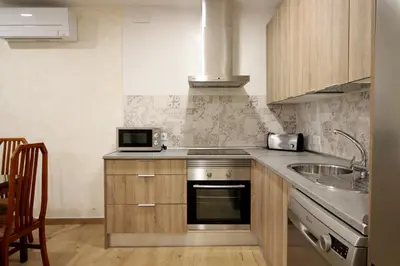 Una cocina o zona de cocina en Apartamento turístico la Vera