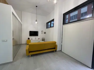 Una televisión o centro de entretenimiento en Nuevo apartamento Folin