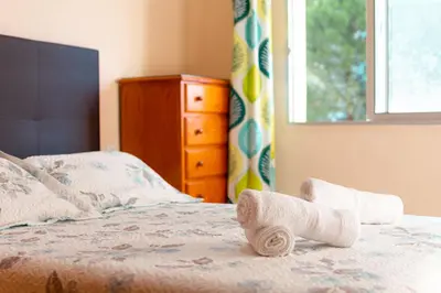 Cama o camas de una habitación en El nido de Cigüeñas