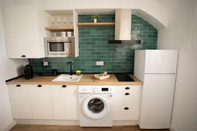 Una cocina o zona de cocina en Apartamento Baluarte de los Pozos