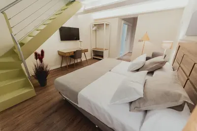 Cama o camas de una habitación en Olivae Hostal Boutique