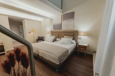 Cama o camas de una habitación en Olivae Hostal Boutique