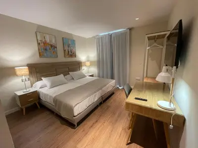 Cama o camas de una habitación en Olivae Hostal Boutique