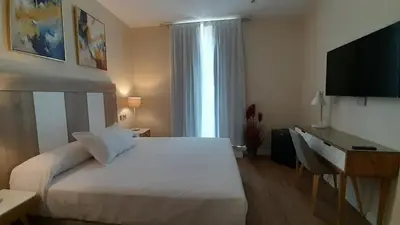 Cama o camas de una habitación en Olivae Hostal Boutique