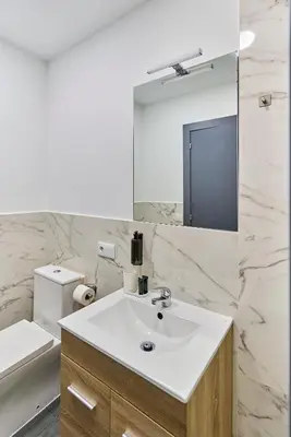 Un baño de Apartamentos Margarita by gaiarooms