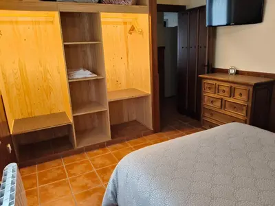 Cama o camas de una habitación en VuT Casa Fabe12