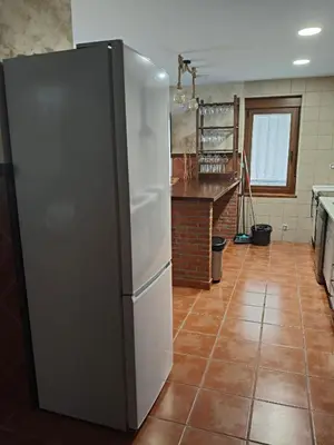Una cocina o zona de cocina en VuT Casa Fabe12