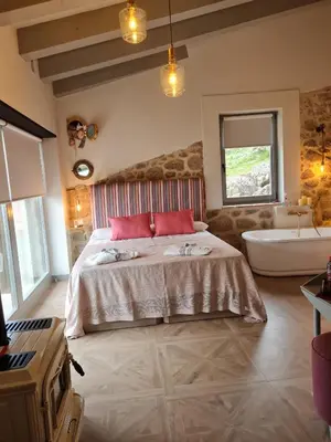 Cama o camas de una habitación en El Escondite del Agua