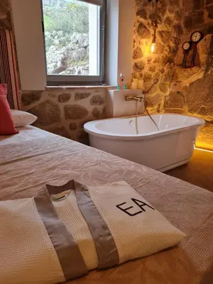 Cama o camas de una habitación en El Escondite del Agua