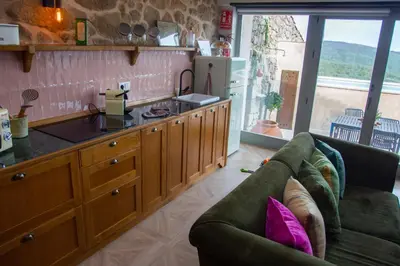 Una cocina o zona de cocina en El Escondite del Agua