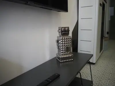 Una televisión o centro de entretenimiento en La Casa Rebonita PICCOLA