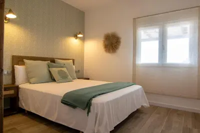Cama o camas de una habitación en La Lagunilla Golf
