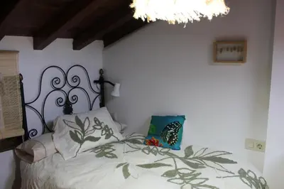 Cama o camas de una habitación en La turronera de La Alberca