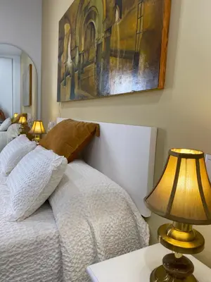 Cama o camas de una habitación en La Trastienda de Matilde