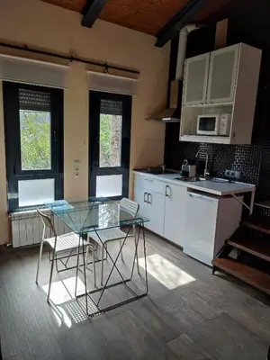 Una cocina o zona de cocina en la casa de las cabilas