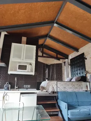Una cocina o zona de cocina en la casa de las cabilas