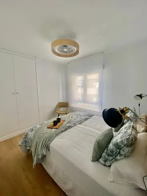 Cama o camas de una habitación en Apartamento La Muralla