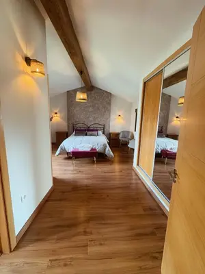 Cama o camas de una habitación en EL CORRAL DE LA VERA